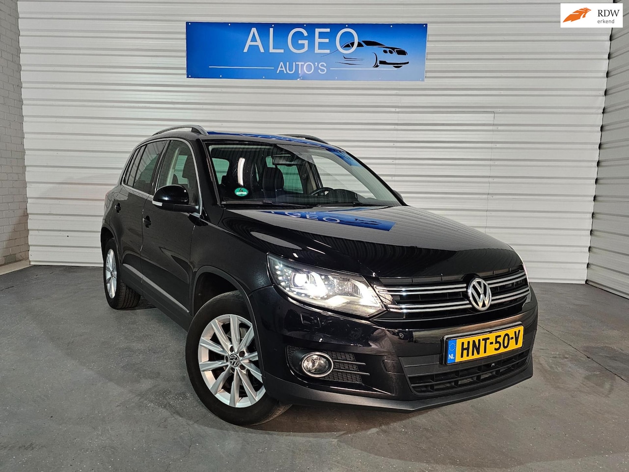 Volkswagen Tiguan - 2.0 TSI Sport&Style 4Motion / Panorama / LED - AutoWereld.nl