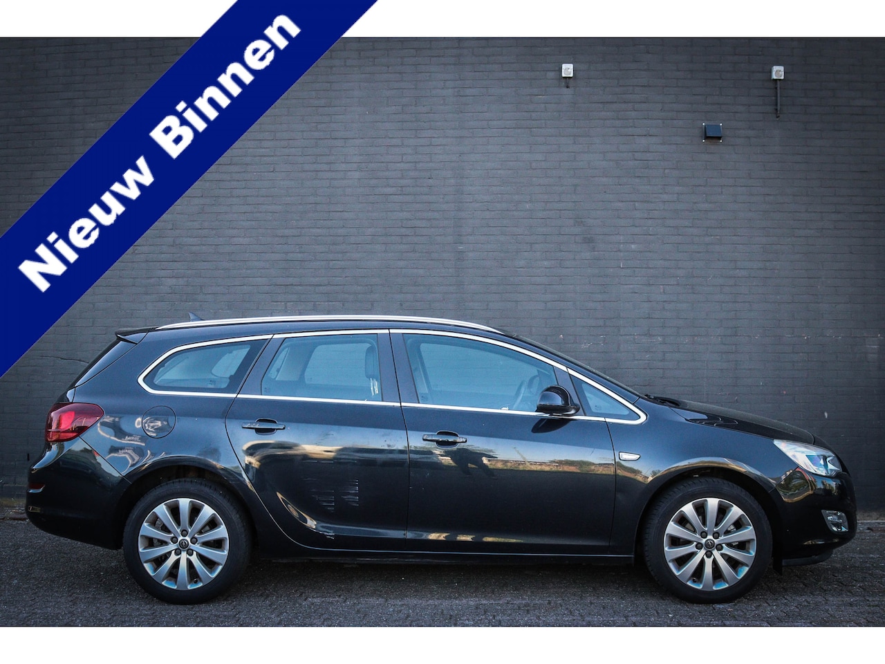 Opel Astra Sports Tourer - 1.4 Turbo Sport Net binnen, wodt nog klaargemaakt - AutoWereld.nl