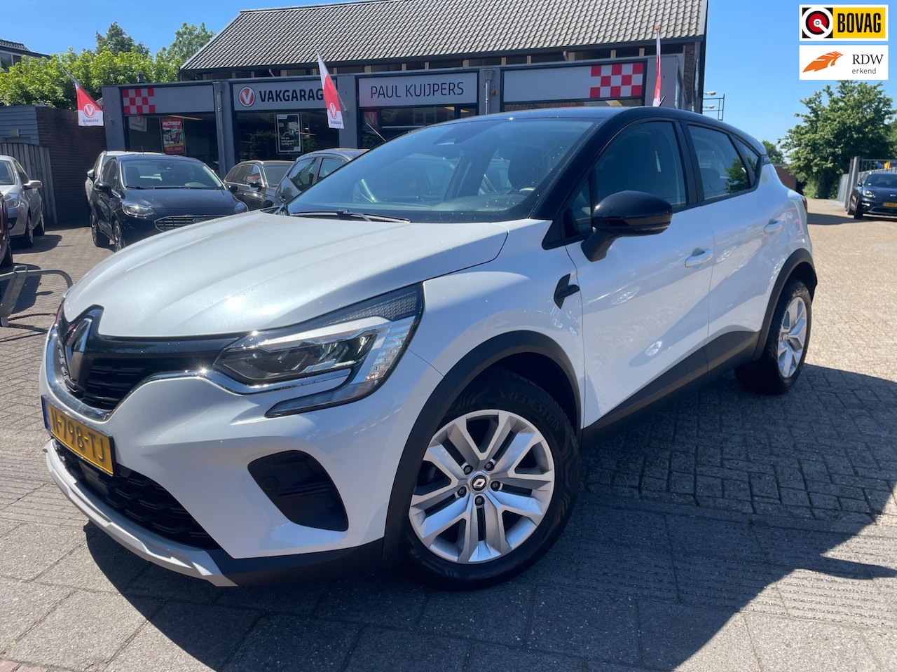 Renault Captur - 1.0 TCe 90 Full Option *navi + PDC v/a + camera* - AutoWereld.nl