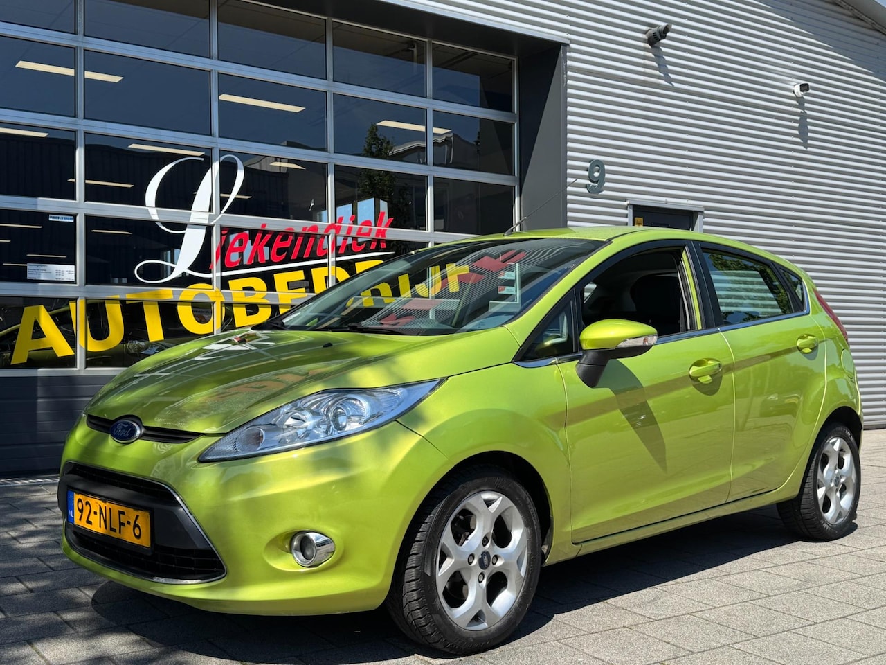 Ford Fiesta - 1.25 -16V Titanium 5Drs - Airco I Comfort pakket I Sport velgen I - AutoWereld.nl