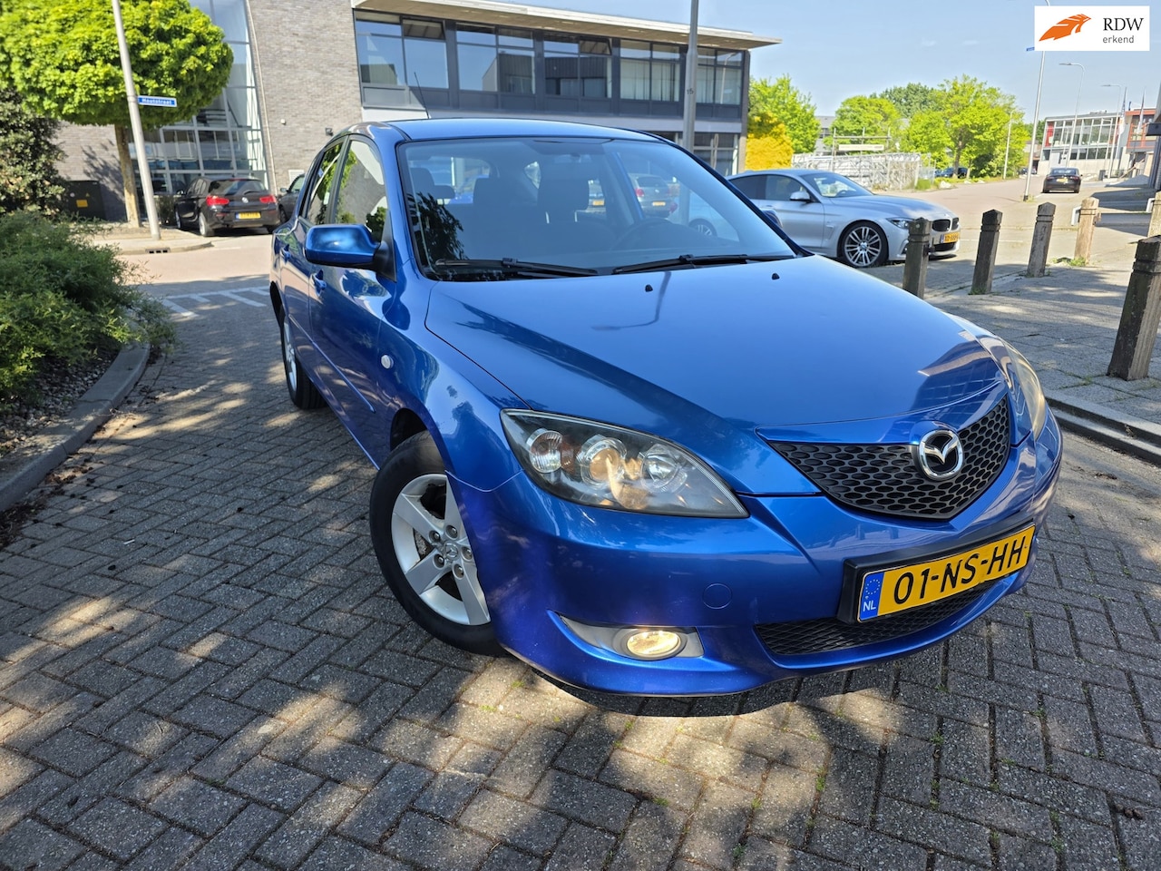 Mazda 3 Sport - 1.6 Touring Airco scherm 5 DR APK 2026 - AutoWereld.nl