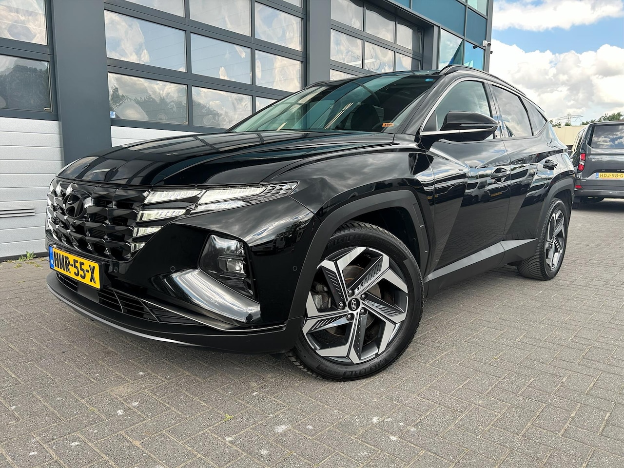 Hyundai Tucson - 1.6 Premium Sky PHEV 265pk AWD, Leder, Pano - AutoWereld.nl