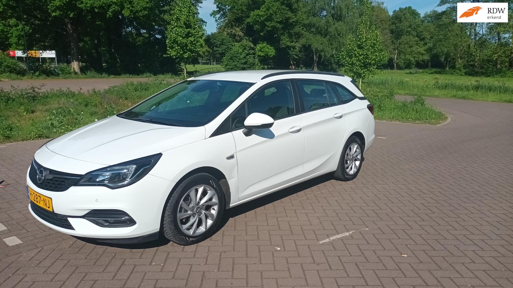 Opel Astra Sports Tourer - 1.2 Clima / Cruise / Pdc - AutoWereld.nl