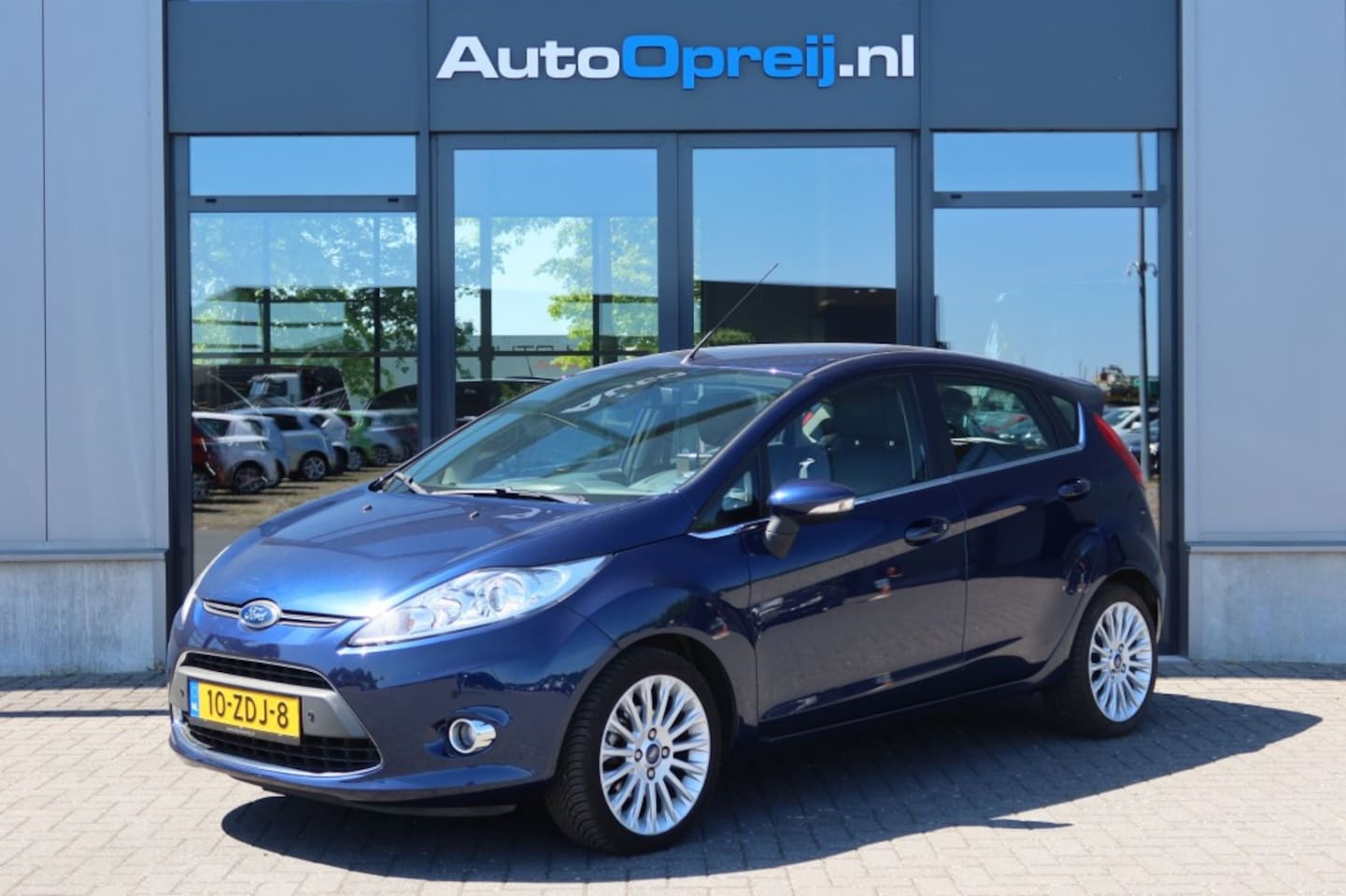 Ford Fiesta - 1.6 Titanium 120pk 5drs. Clima, NAVI, Leder bekl, Stoelverwarmi - AutoWereld.nl