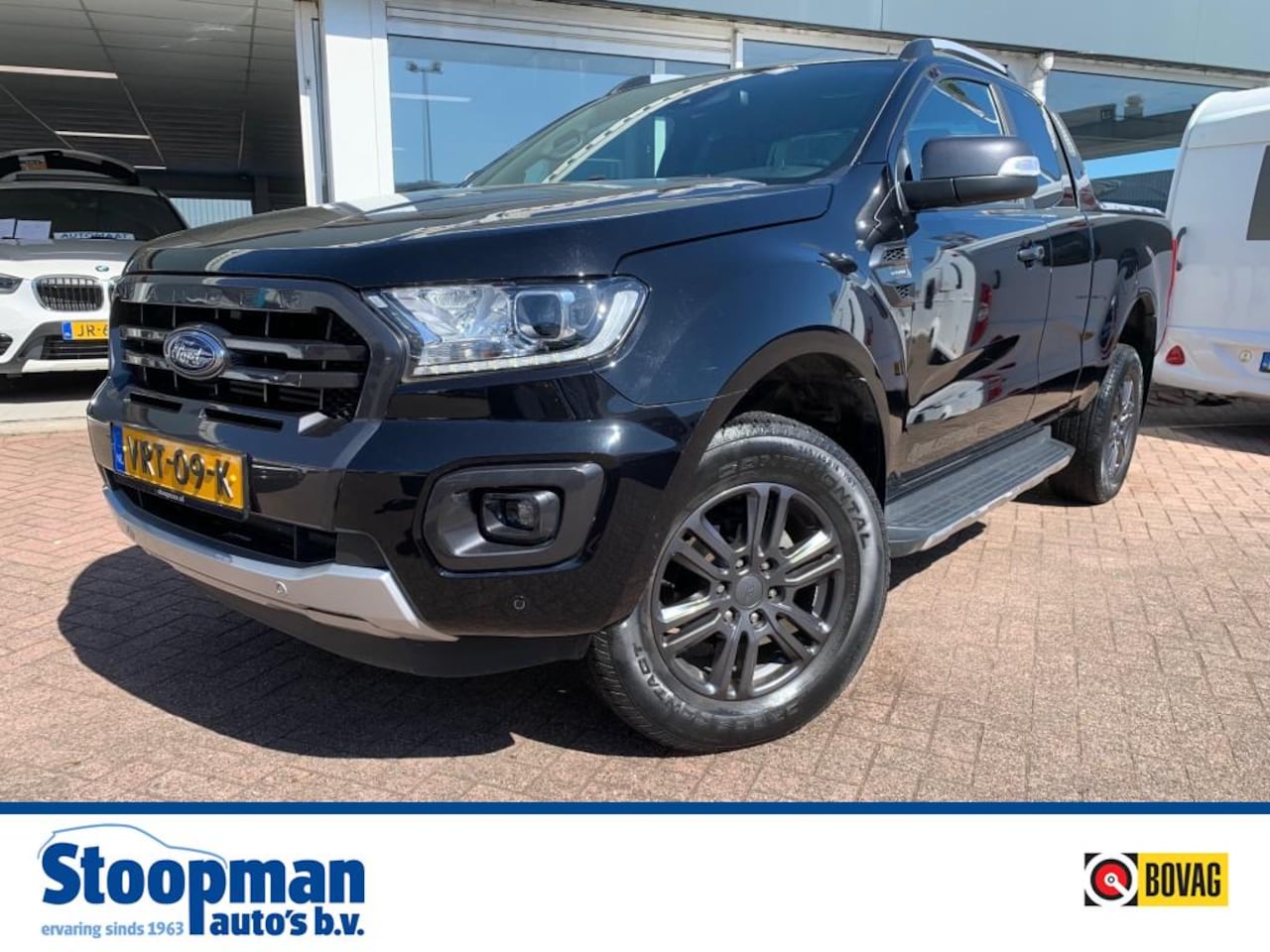 Ford Ranger - 2.0 Wildtrak 4x4 Aut. X-tra Cab. Clima Bedcover - AutoWereld.nl