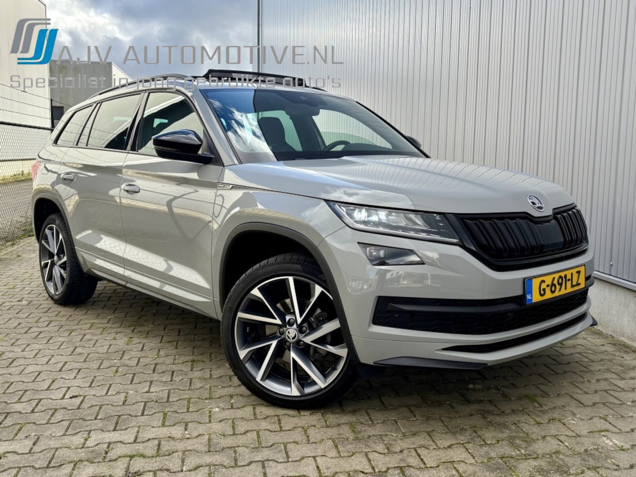 Skoda Kodiaq - 1.5 TSI AUT SPORTLINE BUS. 7 PERSOON STEEL GREY! PANODAK - AutoWereld.nl