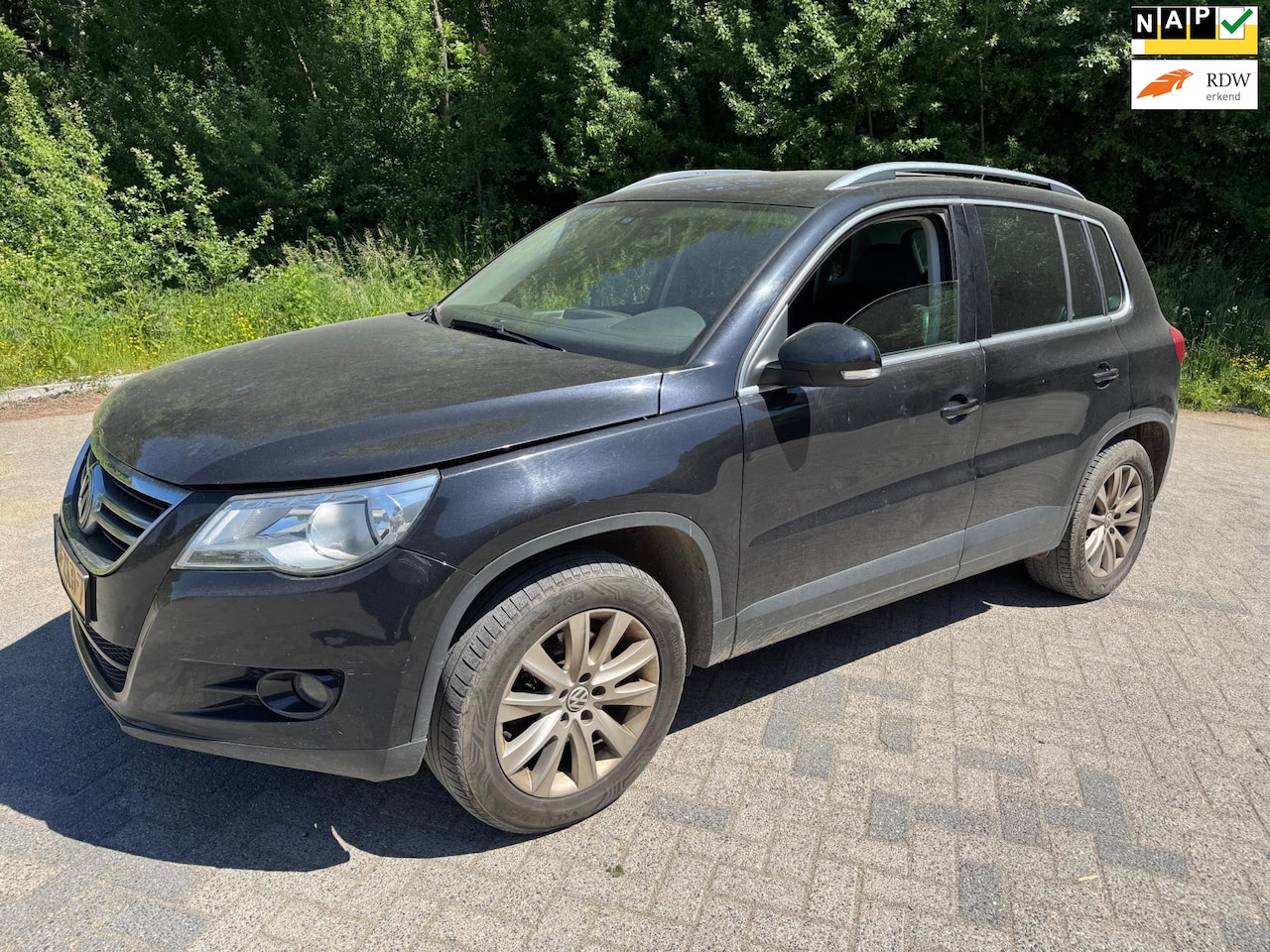 Volkswagen Tiguan - 2.0 TDI Trend&Fun 4Motion 4x4 4WD DSG Leer - AutoWereld.nl