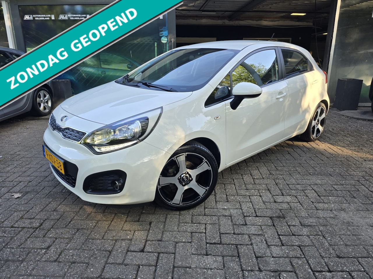 Kia Rio - 1.2 CVVT BusinessLine | 12MND GARANTIE | CRUISE | AIRCO | LMV - AutoWereld.nl