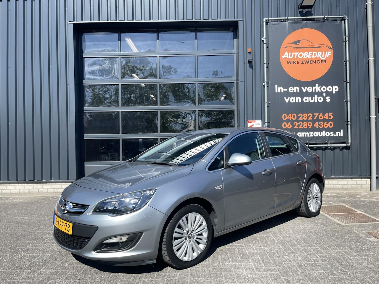 Opel Astra - 1.4 Turbo Design Edition NAVIGATIE|TREKHAAK|CAMERA|CRUISE CONTROL|AIRCO|HALF LEER - AutoWereld.nl
