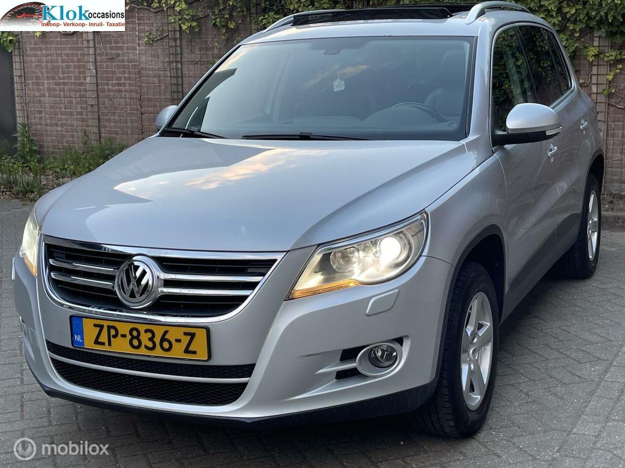 Volkswagen Tiguan - 2.0 TSI Sport&Style 4Motion Leer Cruise - AutoWereld.nl