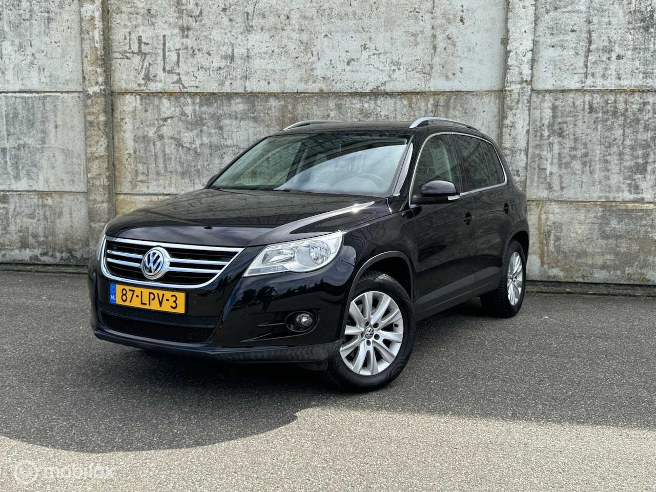 Volkswagen Tiguan - 1.4 TSI Sport&Style Cruise/Climate/Navi - AutoWereld.nl