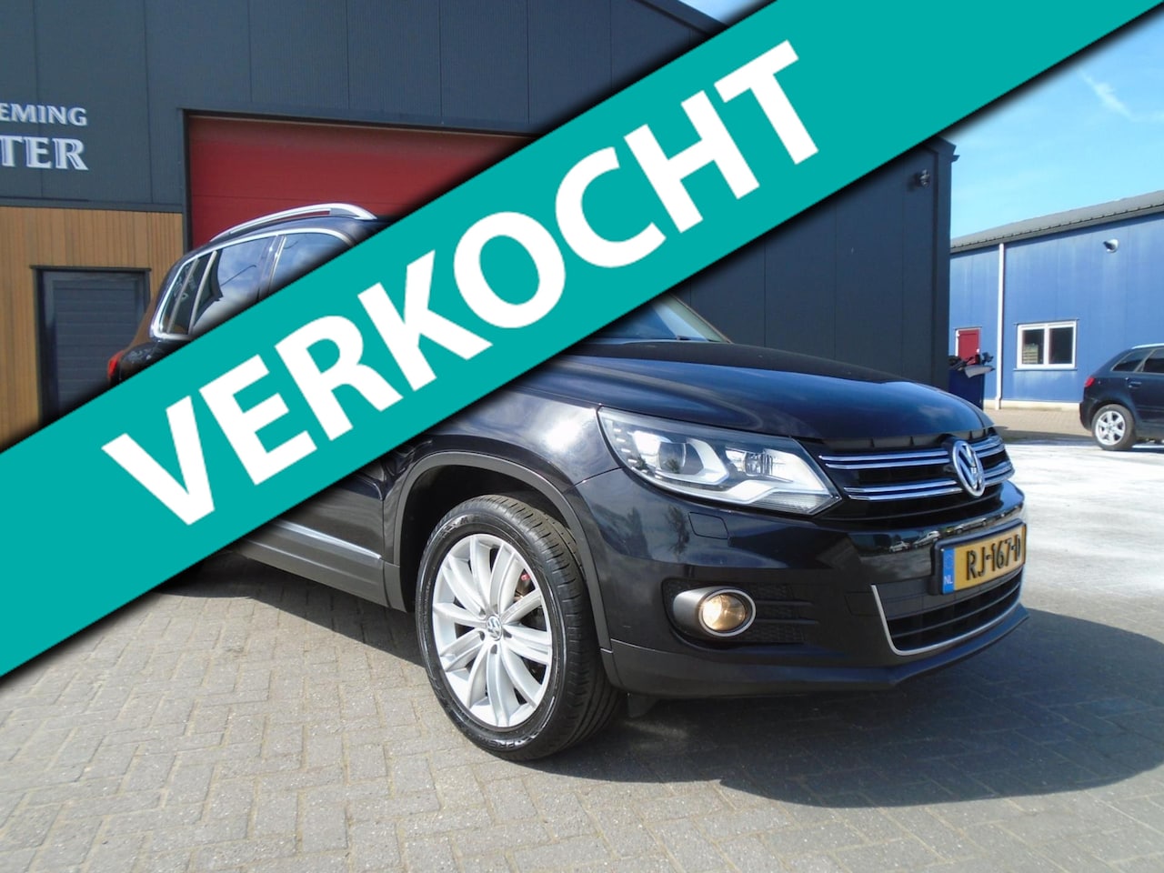 Volkswagen Tiguan - 2.0 TDI Sport&Style navi led cruise clima zeer nette tiguan - AutoWereld.nl