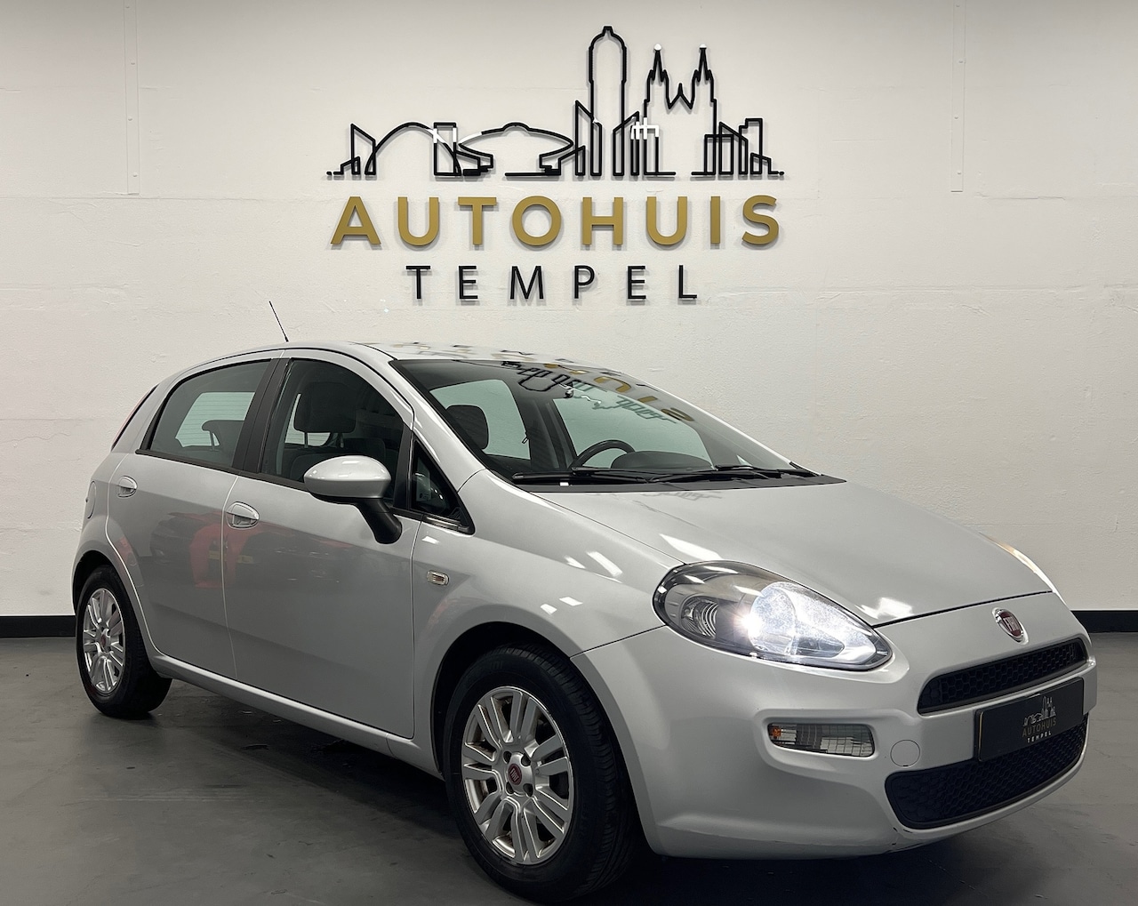 Fiat Punto Evo - 1.2 Pop Airco 5Drs Trekhaak Elektrische Ramen Isofix - AutoWereld.nl
