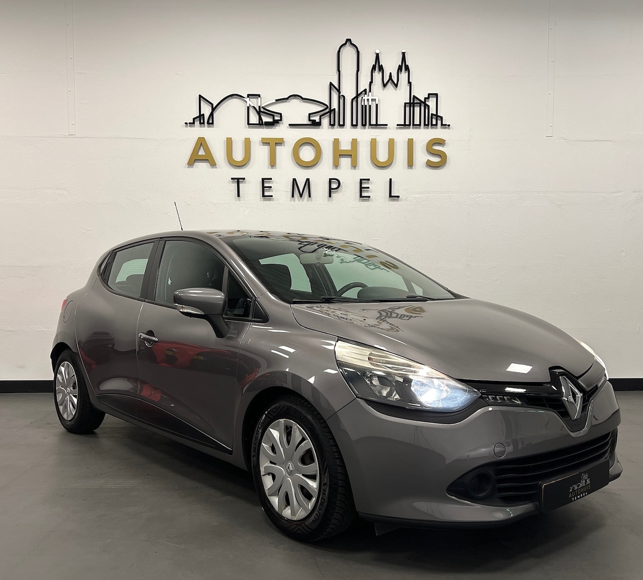 Renault Clio - 1.2 Night & Day Airco Cruise Trekhaak 5Drs Isofix - AutoWereld.nl