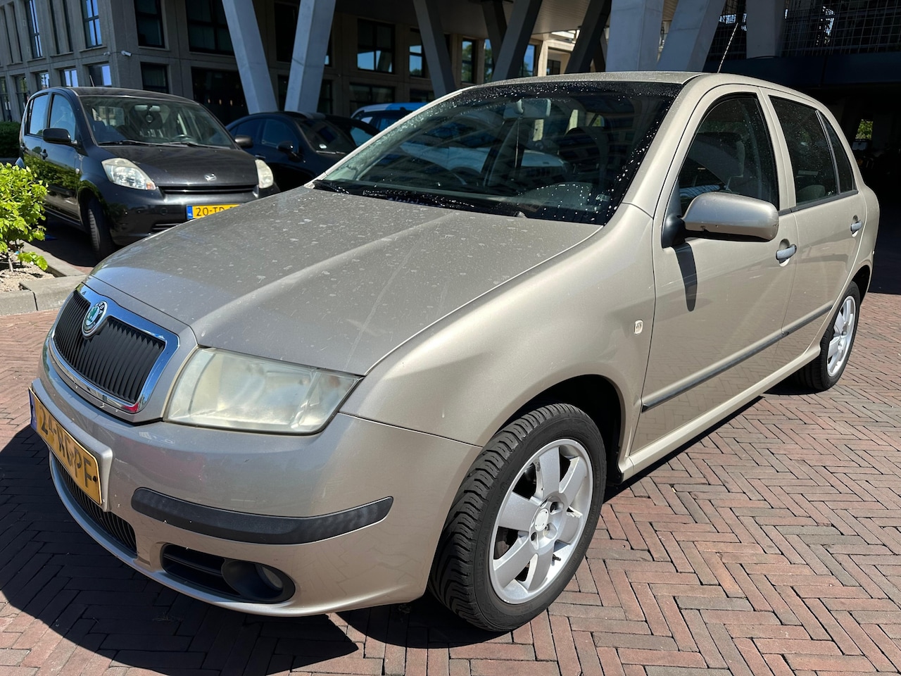 Skoda Fabia - 1.4-16V Elegance AUTOMAAT Airco Cruise Dealer Onderhouden 1e Eigenaar - AutoWereld.nl