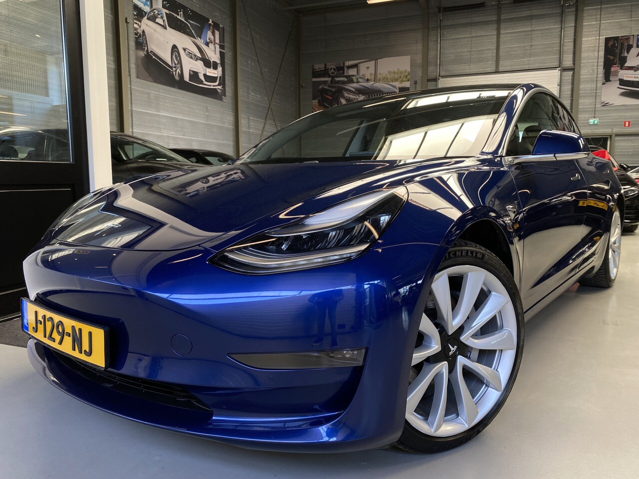 Tesla Model 3 - Long Range RWD Long Range AWD 75 kWh 19inch, Pano, Leer - AutoWereld.nl