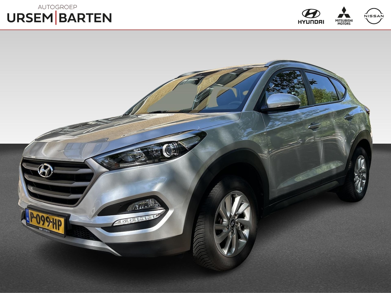 Hyundai Tucson - 1.6 GDi Comfort | navigatie | trekhaak | cruise control | climate control | achteruitrijca - AutoWereld.nl
