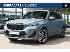 BMW X1 - xDrive23i High Executive M Sport Automaat / Panoramadak / Trekhaak / Sportstoelen / Adapti