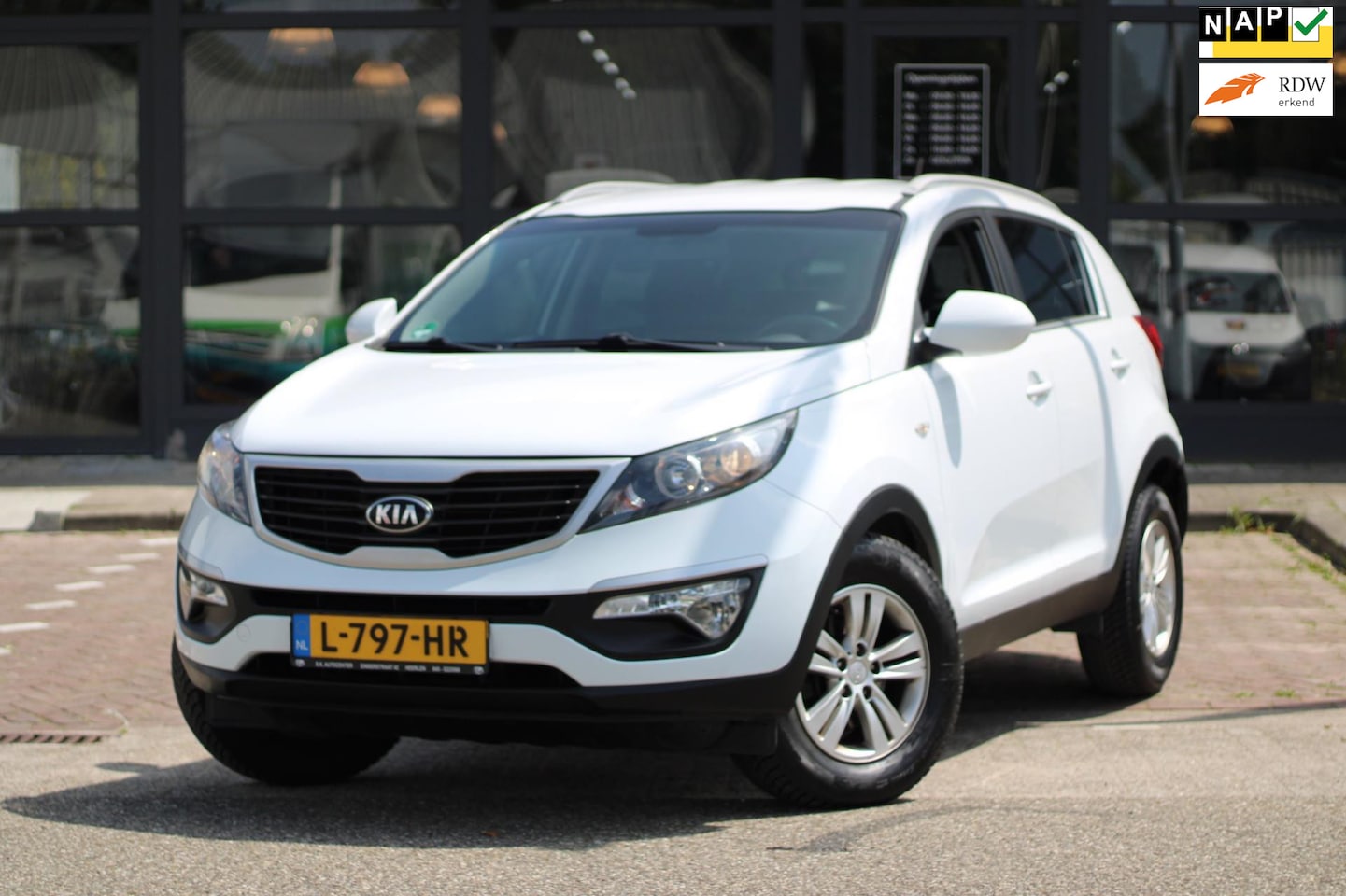 Kia Sportage - 1.6 16V 143.000KM|STLVRWRMNG|BLUETOOTH|AIRCO|NAVI - AutoWereld.nl