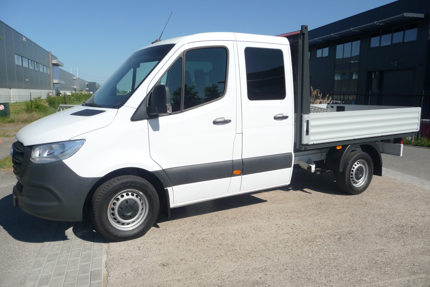 Mercedes-Benz Sprinter - 315 CDI L2 DC E6 trekhaak 3500kg laadbak 270cm 7 zits - AutoWereld.nl