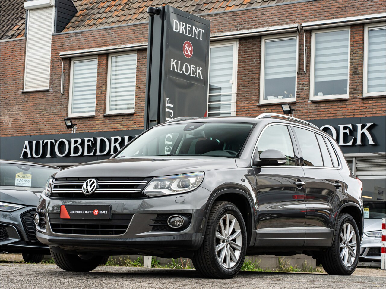 Volkswagen Tiguan - 1.4 TSI Sport&Style XENON CAMERA STOELVERW CRUISE TREKHAAK - AutoWereld.nl