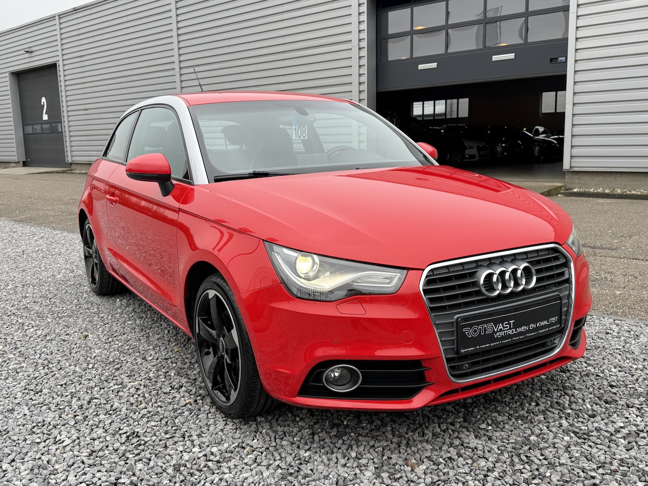 Audi A1 - 1.4 TFSI Proline S S-Tronic Navi|Leer|Xenon|PDC|Cruis Rood! - AutoWereld.nl