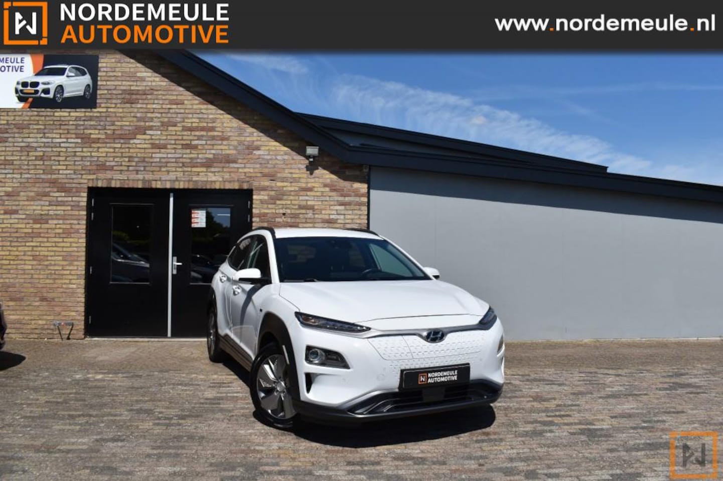 Hyundai Kona - EV Premium 64 kWh EV PREMIUM 64 KWH, HUD, Navi, Camera - AutoWereld.nl