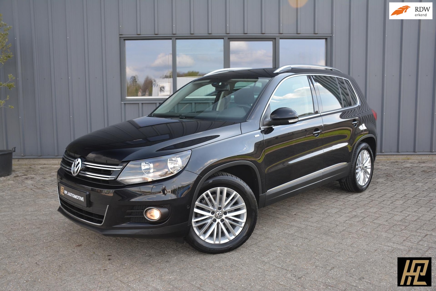 Volkswagen Tiguan - 1.4 TSI Sport&Style - AutoWereld.nl