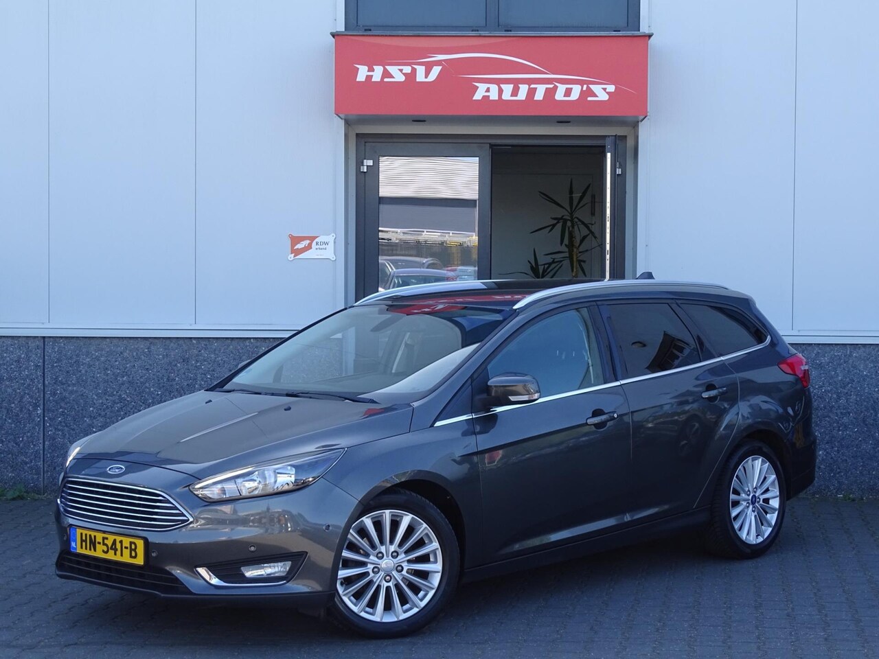 Ford Focus Wagon - 1.0 Titanium Edition navi LEER org NL - AutoWereld.nl