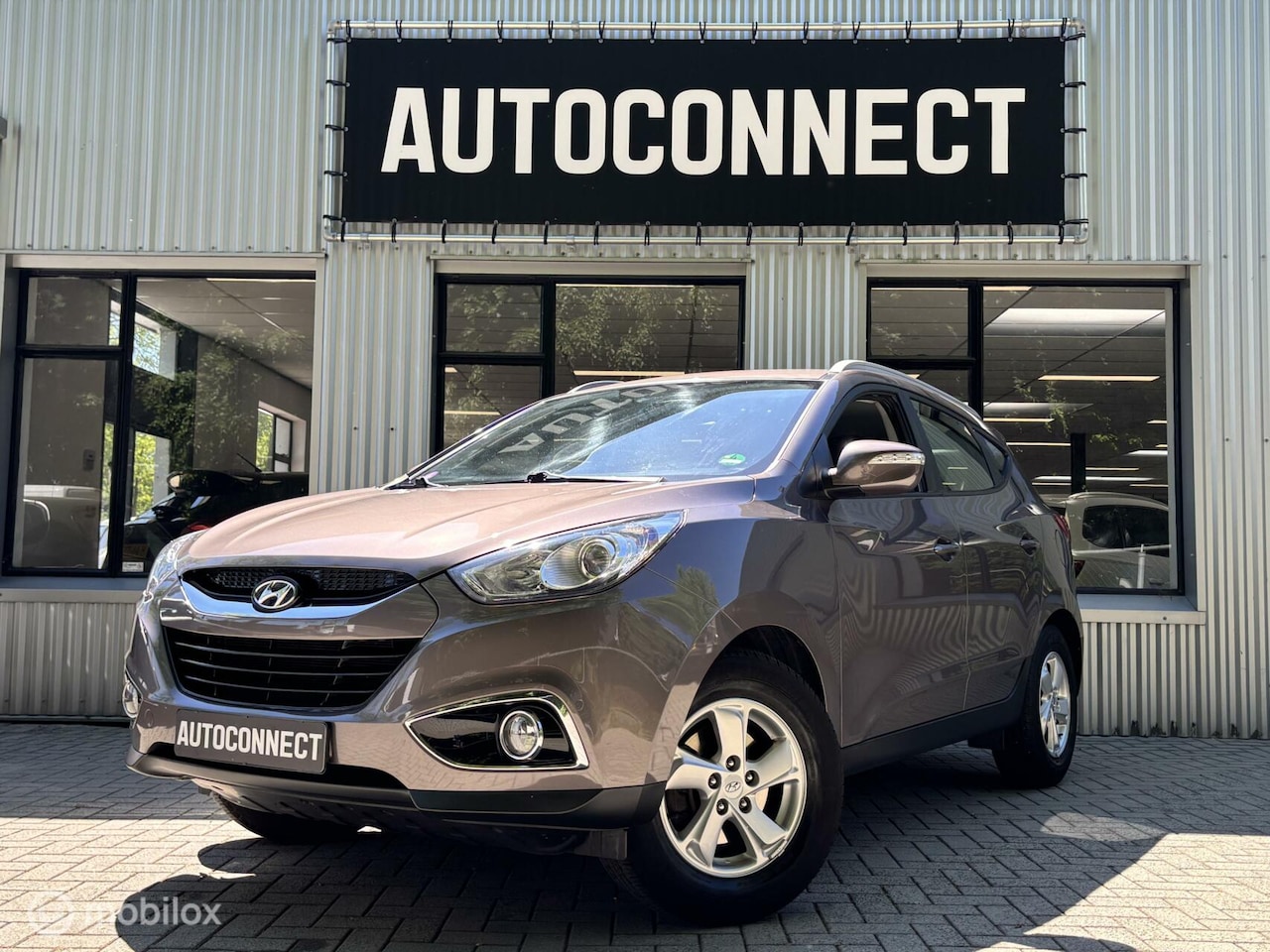 Hyundai ix35 - 2.0i. NAVI, CAMERA, CLIMA, STOELVERWARMING - AutoWereld.nl