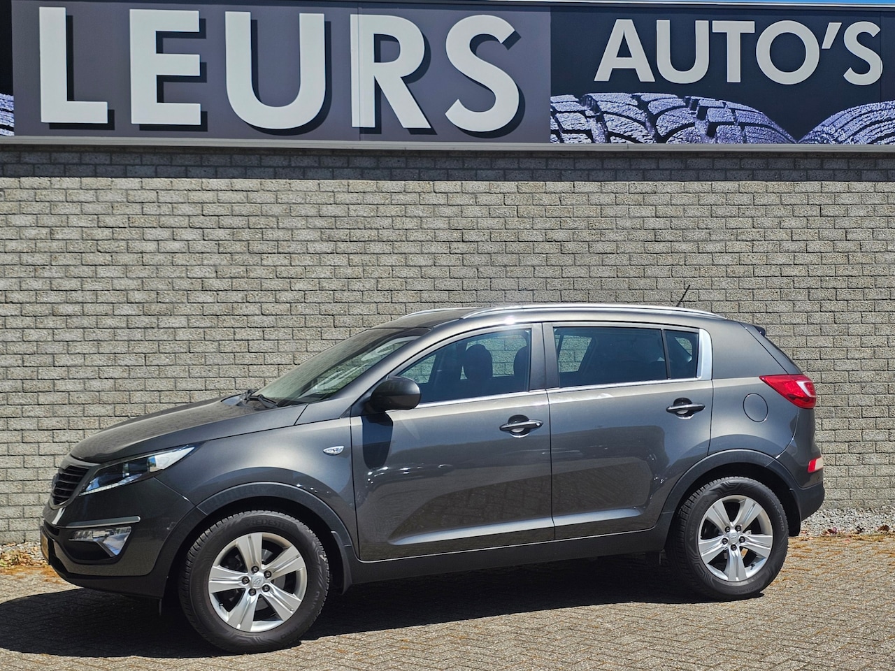 Kia Sportage - 1.6 GDI X-ecutive Plus Pack Airco/CcrPdc - AutoWereld.nl