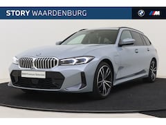 BMW 3-serie Touring - 330e High Executive M Sport Automaat / Panoramadak / Trekhaak / Sportstoelen / Adaptieve L