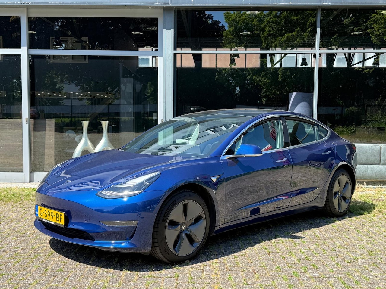 Tesla Model 3 - Standard RWD Plus 60 kWh Auto pilot - AutoWereld.nl
