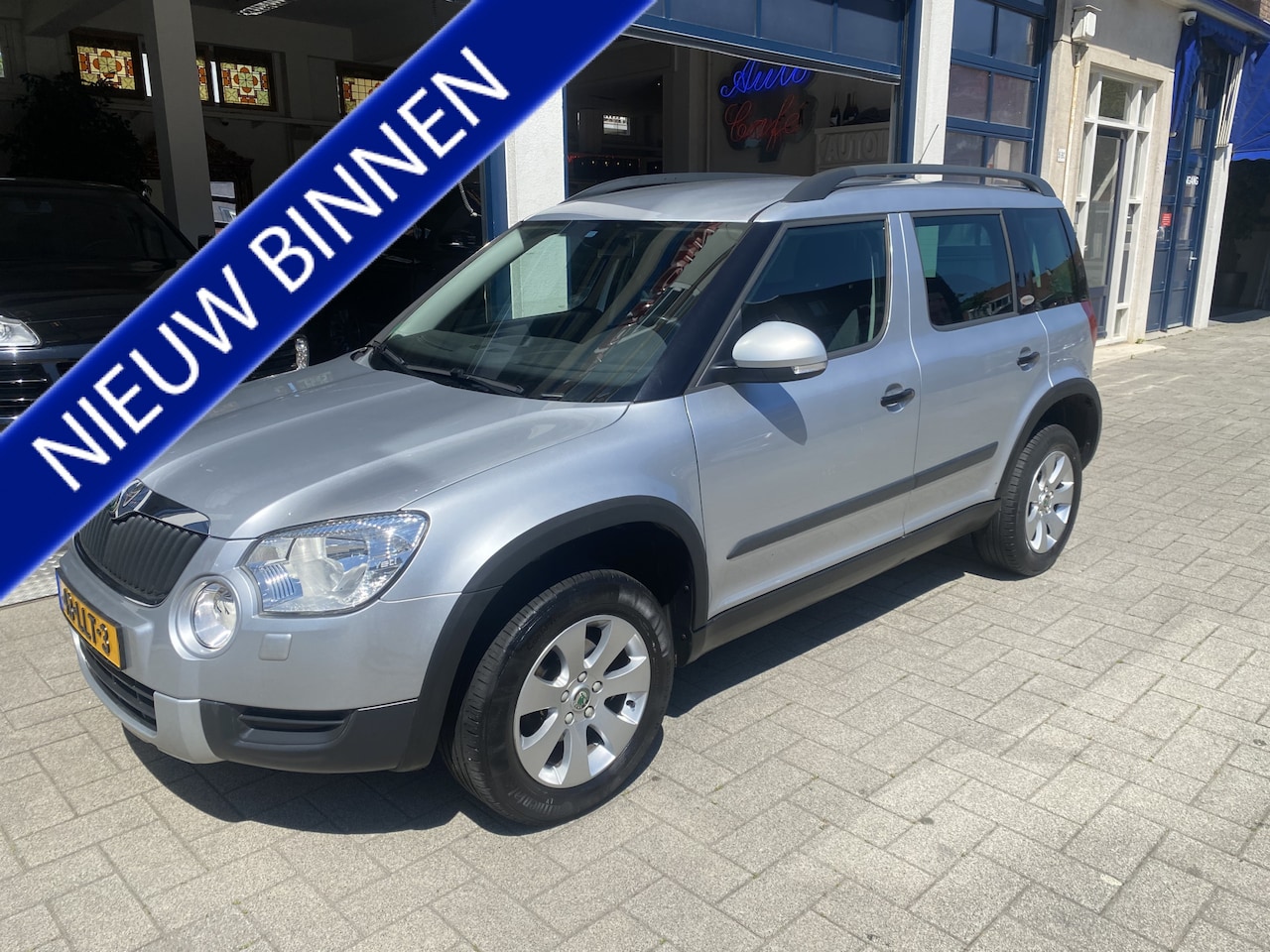 Skoda Yeti - 1.2 TSI Expedition AIRCO/CRUISE/NL AUTO - AutoWereld.nl