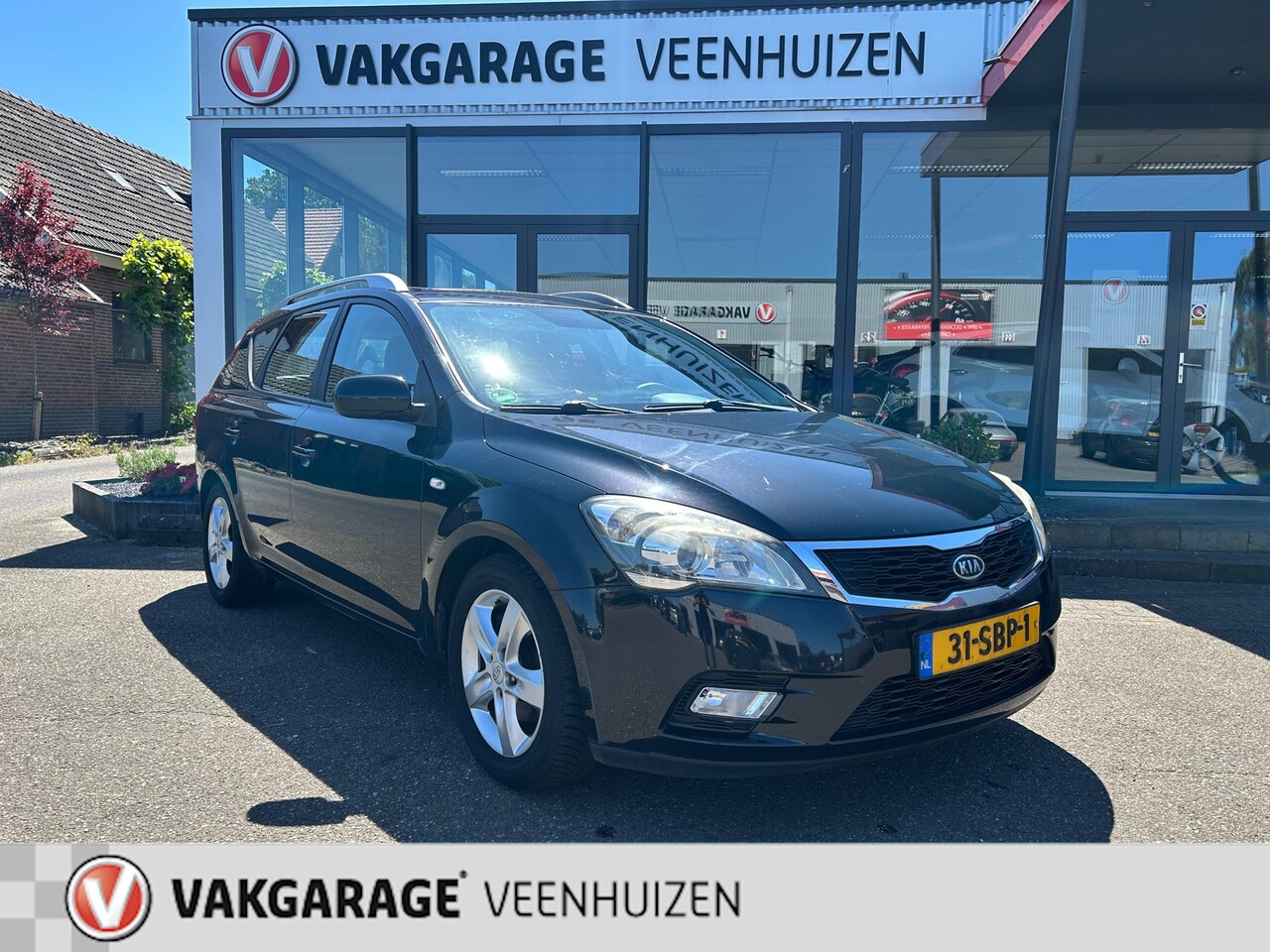 Kia Cee'd Sporty Wagon - 1.4 CVVT Navigator Plus Pack|Trekhaak|Pano|Nieuwe APK| - AutoWereld.nl
