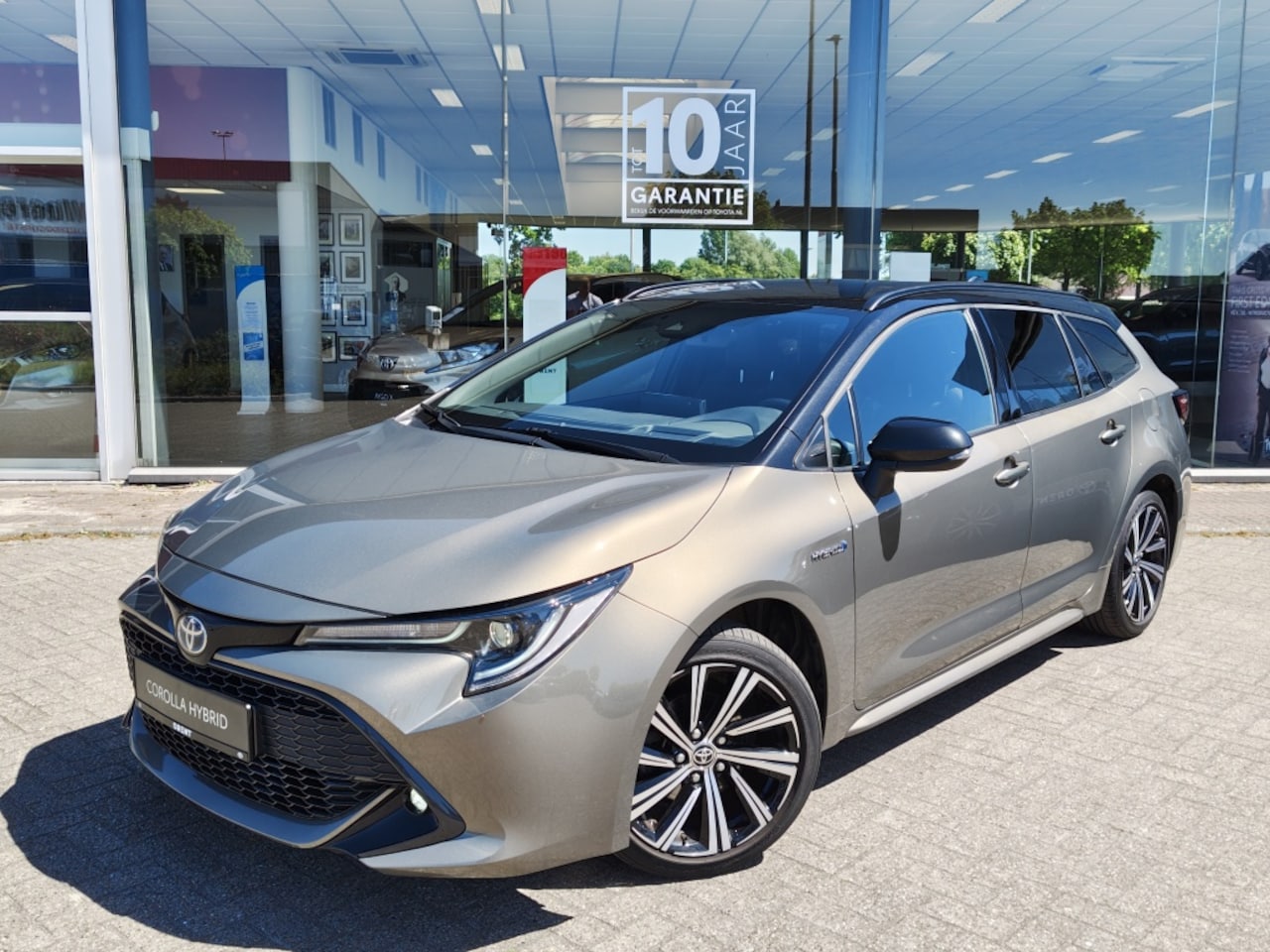Toyota Corolla Touring Sports - 1.8 Hybrid Dynamic Bi-Tone | Trekhaak | Head-Up Display | Stoel- - AutoWereld.nl