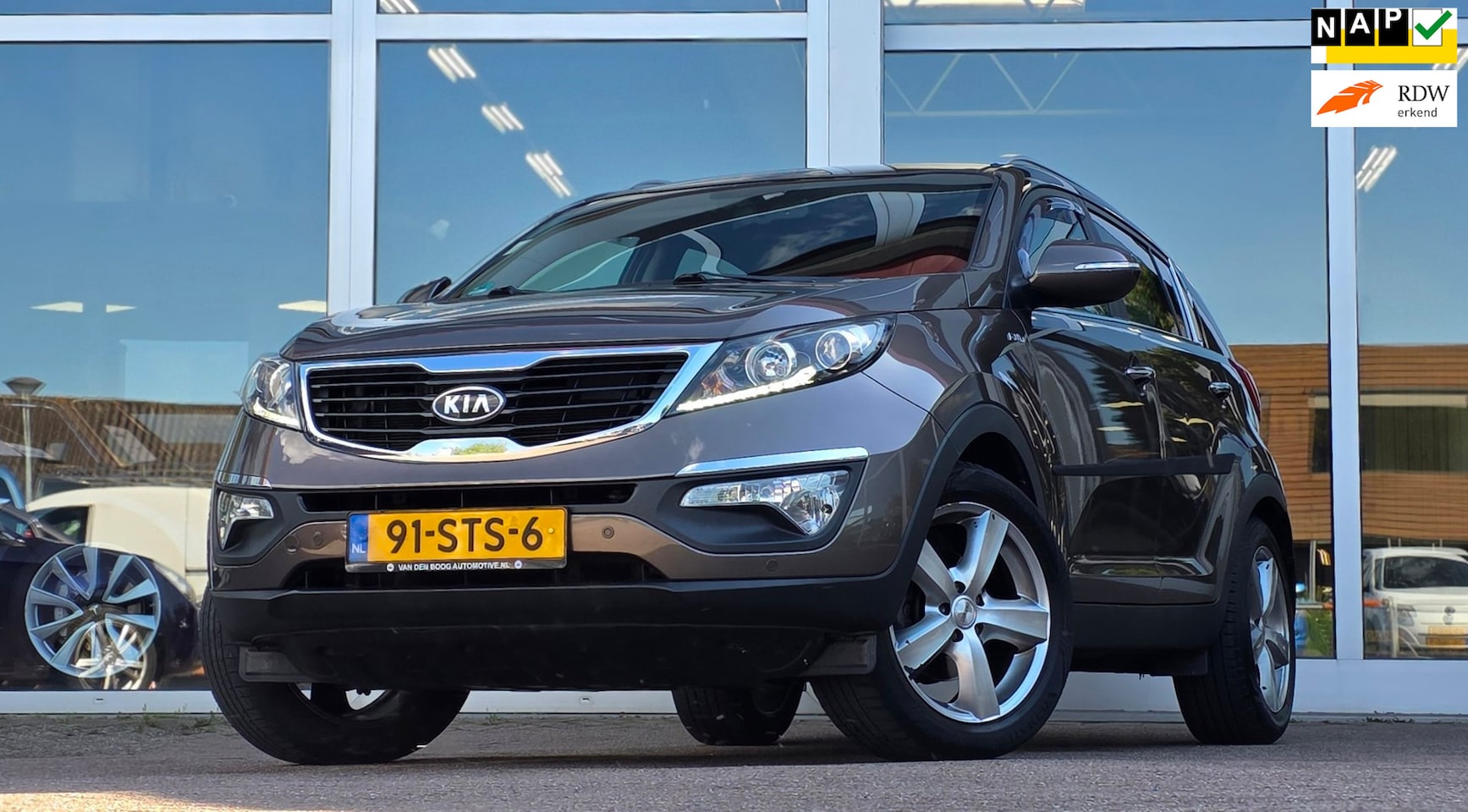 Kia Sportage - 2.0 X-ecutive 4wd Plus Pack Trekhaak Leer A/T Mooi! - AutoWereld.nl