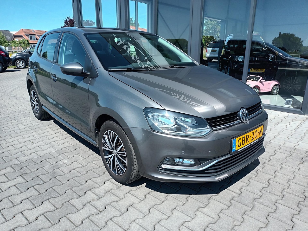 Volkswagen Polo - 1.2 TSI Allstar Navi, cruise, park. V+A - AutoWereld.nl