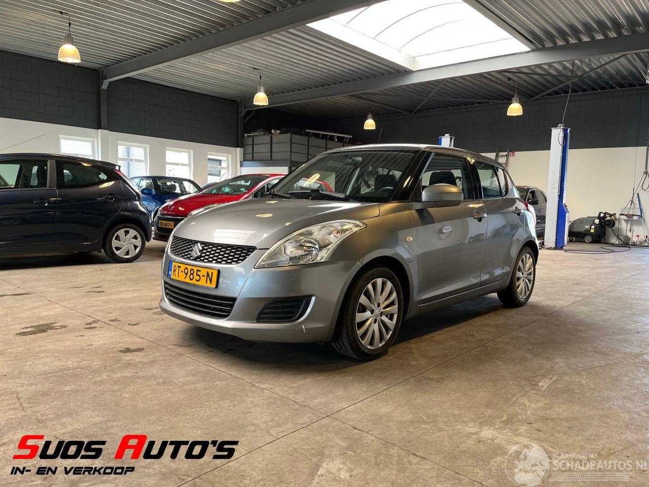 Suzuki Swift - 1.2 Comfort 53.000 KM! - AutoWereld.nl