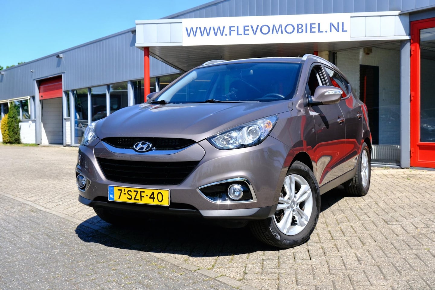 Hyundai ix35 - 1.6i GDI Business Edition Navi|Cam|Clima|LMV - AutoWereld.nl