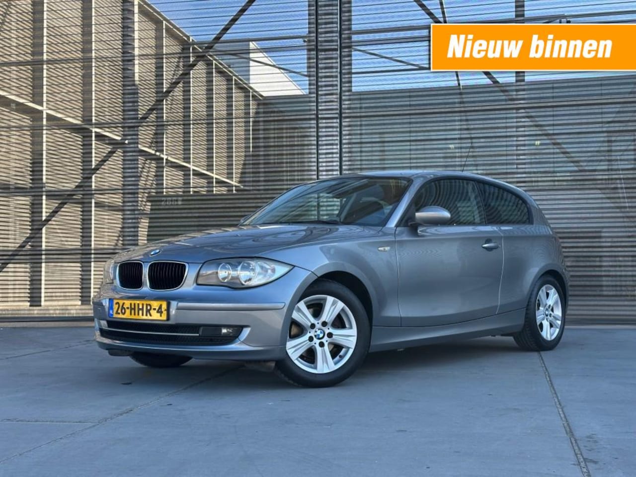 BMW 1-serie - 116I BUSINESS LINE AIRCO/NAVI/LM VELGEN !! - AutoWereld.nl