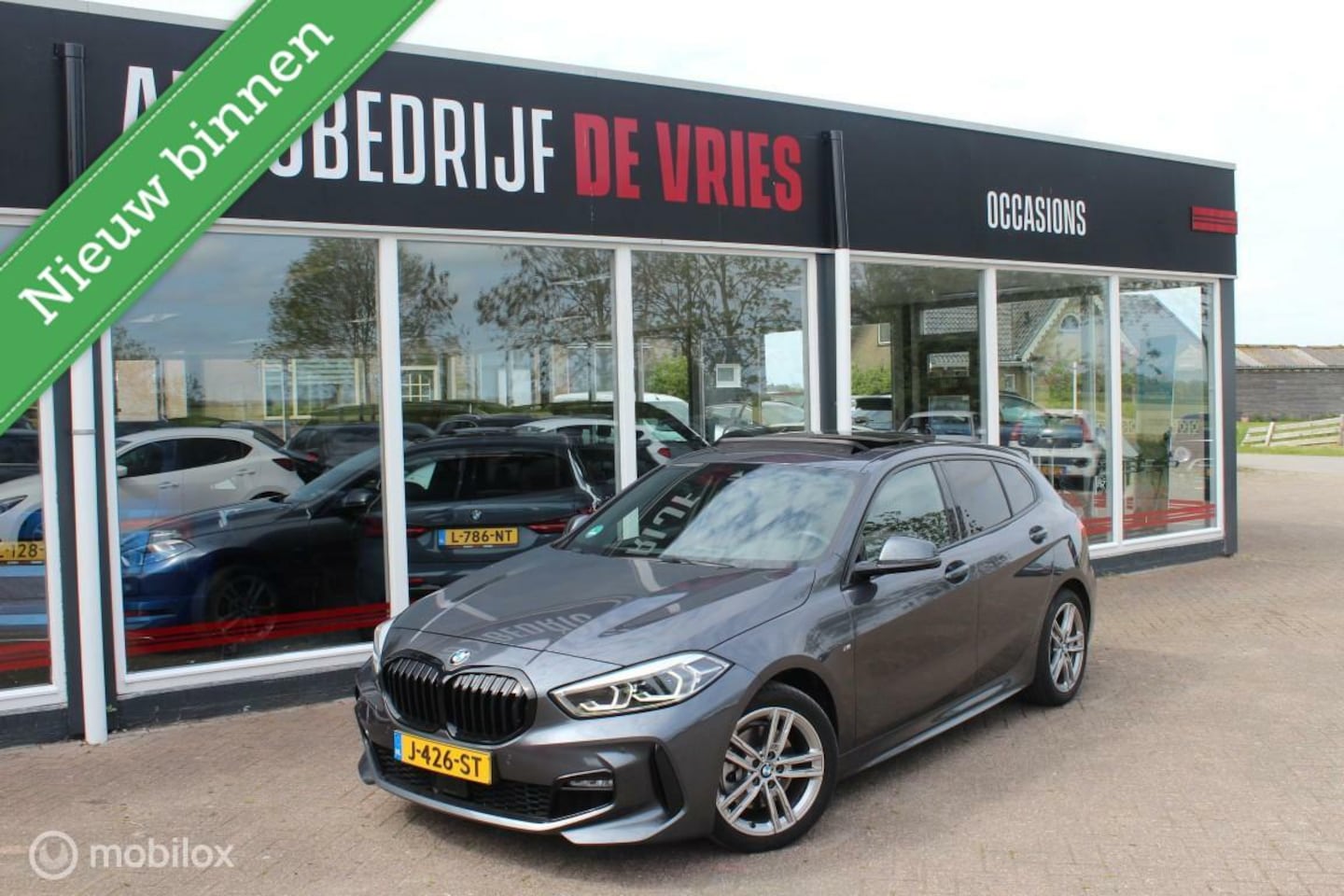 BMW 1-serie - 118i M Sport High Executive PANO/ACC/Camera/NAP - AutoWereld.nl