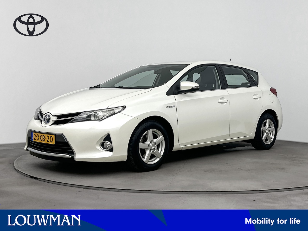 Toyota Auris - 1.8 Hybrid Aspiration Limited | Navigatie | Achteruitrijcamera | LM-velgen | Afneembare tr - AutoWereld.nl