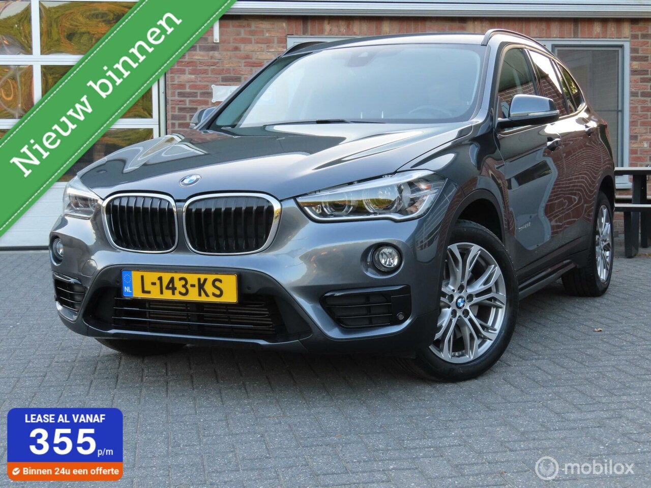 BMW X1 - sDrive20i High Executive/HUD/PDC V-A/18"/afneemb trkhk. - AutoWereld.nl