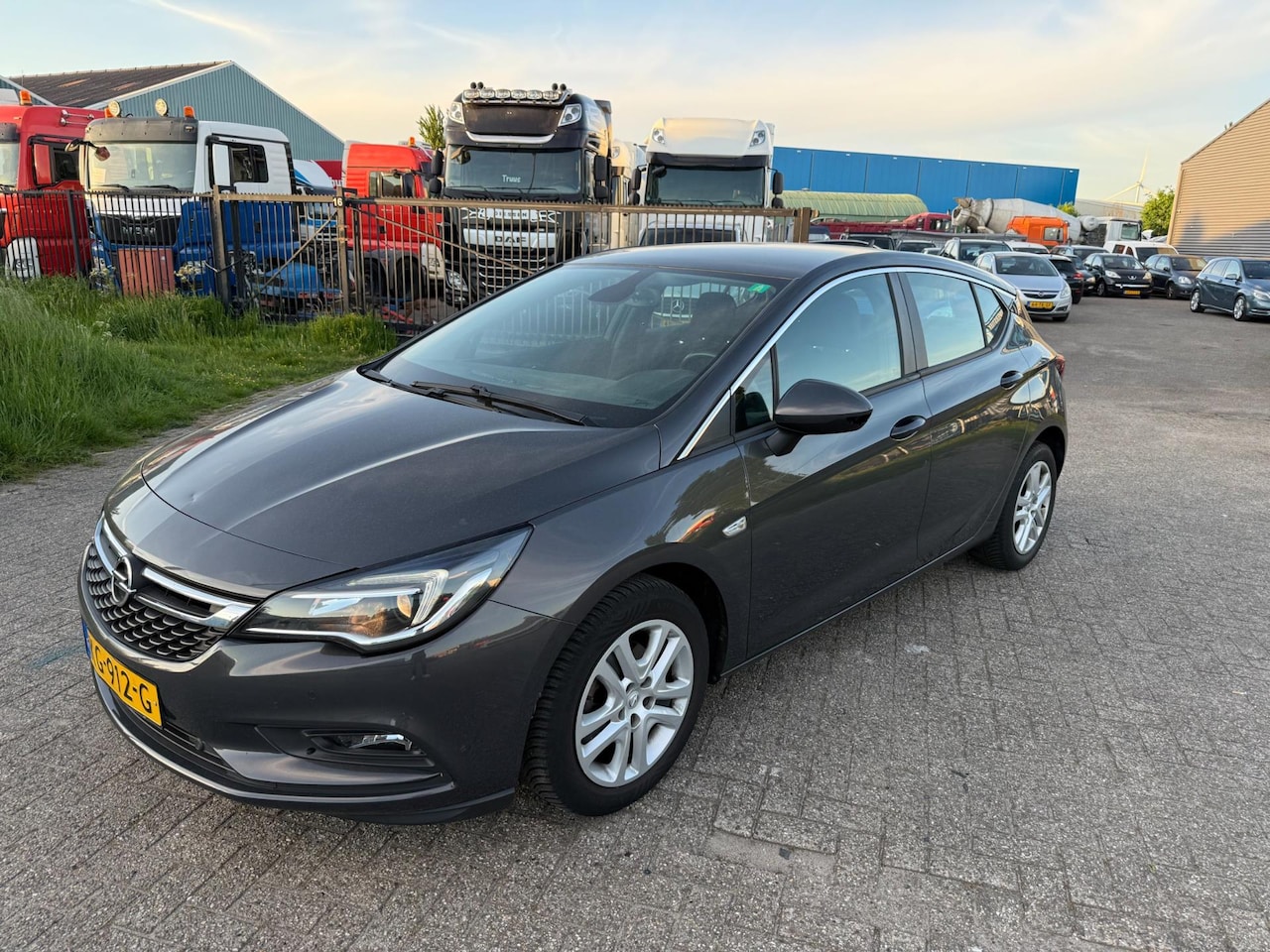 Opel Astra - 1.0 Business+ 5D BJ 2016 Lichte schade rondom! - AutoWereld.nl