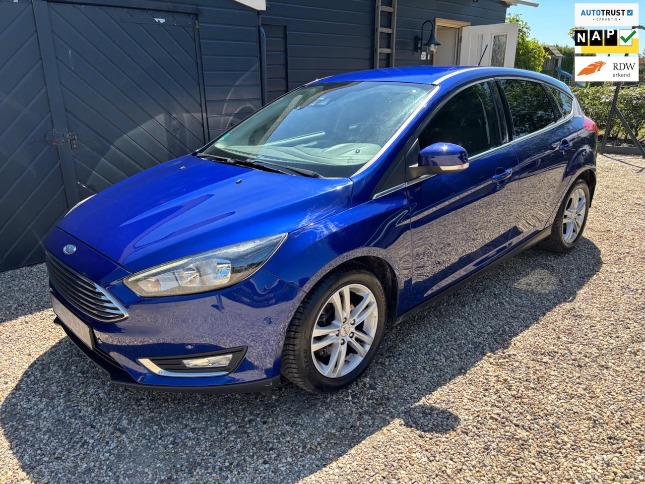 Ford Focus - 125PK Titanium NAVI | CLIMA | STOELVERWARMING | CRUISE CONTROL | CAMERA | PDC - AutoWereld.nl