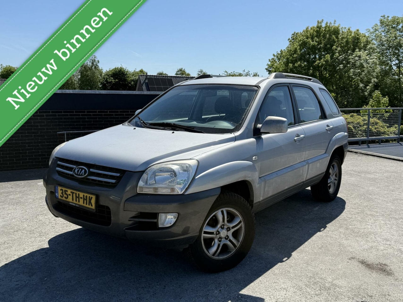 Kia Sportage - 2.0 CVVT COMFORT | AIRCO | TREKHAAK | 2WD - AutoWereld.nl