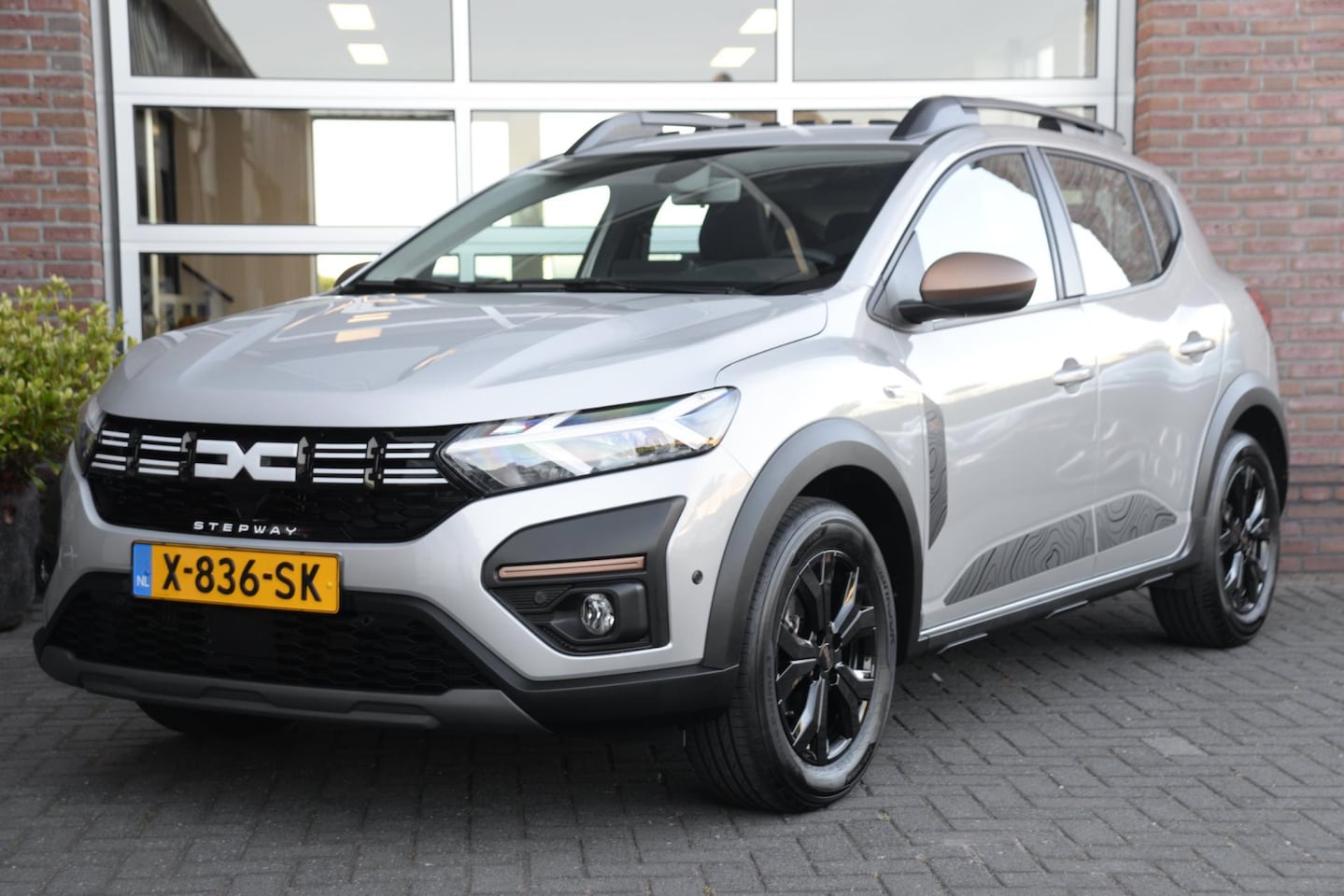 Dacia Sandero Stepway - 1.1 TCe 110 Extreme | Open Dak | Camera | Navigatie | - AutoWereld.nl