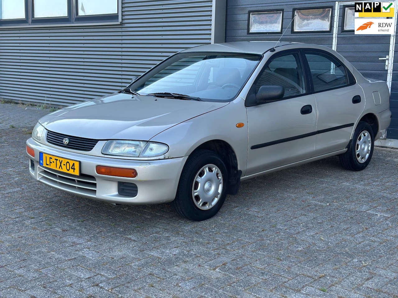 Mazda 323 - 1.5i LX 1.5i LX - AutoWereld.nl