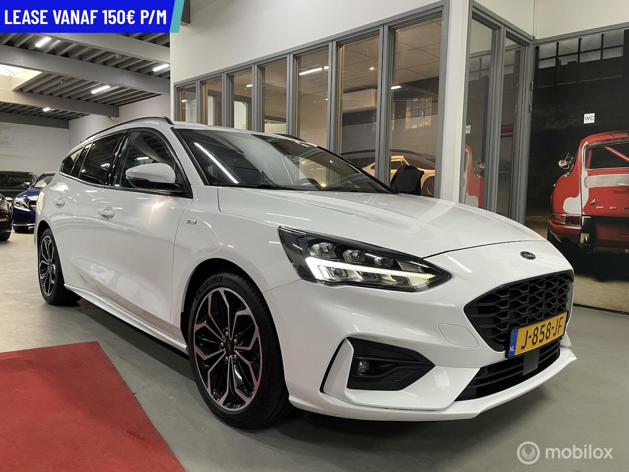 Ford Focus Wagon - 1.0 TURBO ST LINE CARPLAY LED XENON NAVI CRUISE VELGEN TREKHAAK - AutoWereld.nl